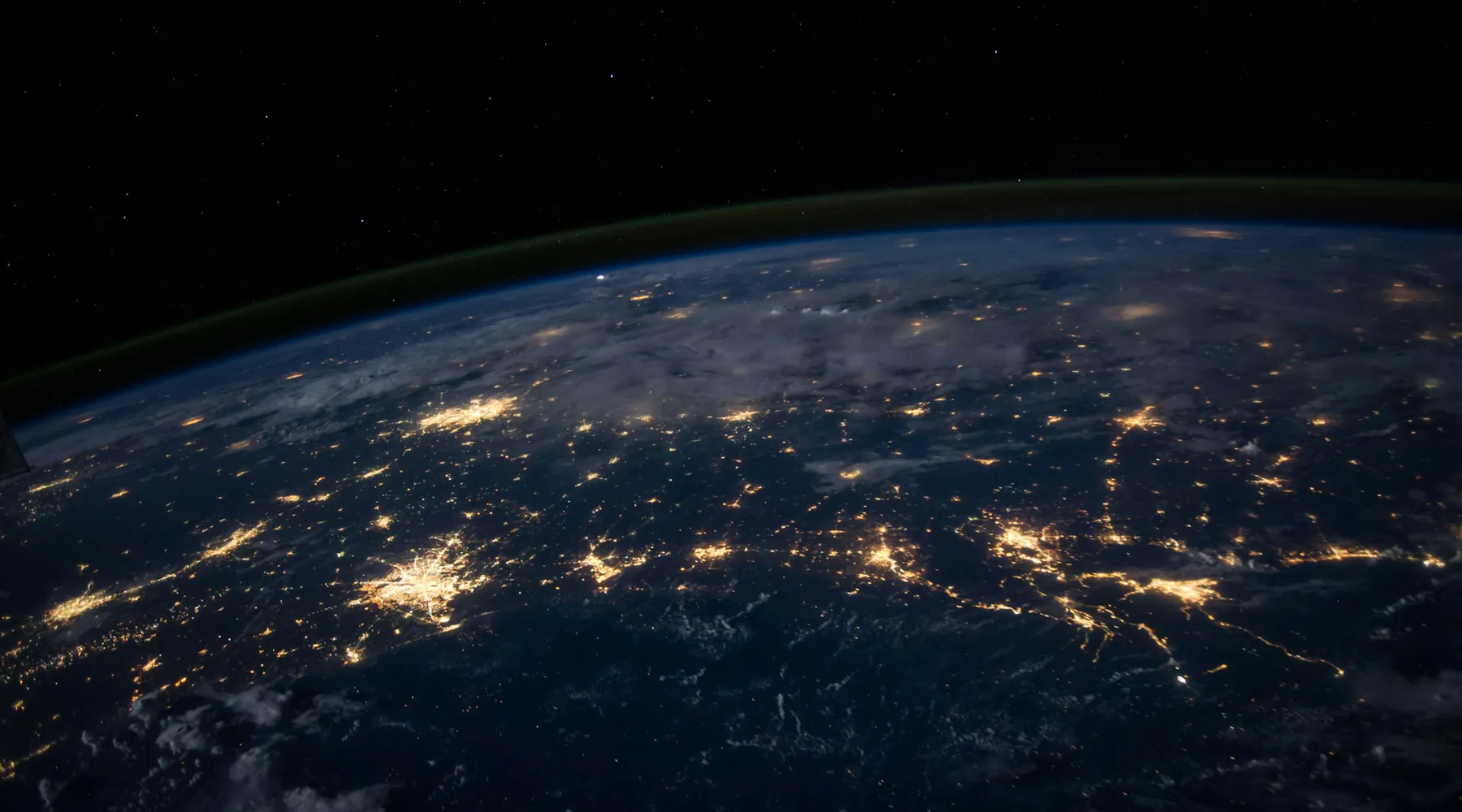 Earth at night showing connected international markets served by 6767 Capital